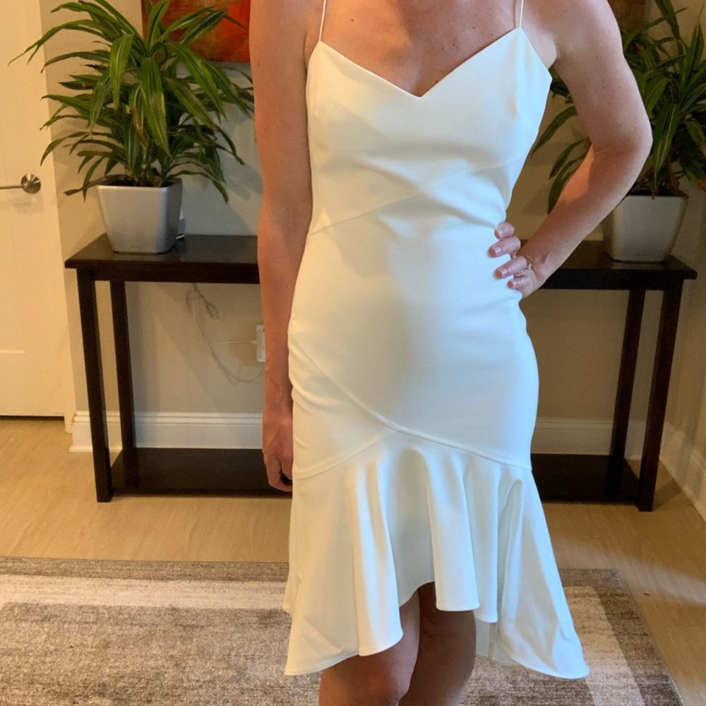 Likely size 0 white cocktail dress
